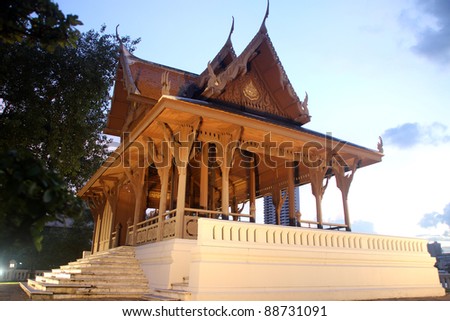 Wooden pavilion Satichai Prakarn on the bank of Chao Phraya river at night, Bangkok, Thailand