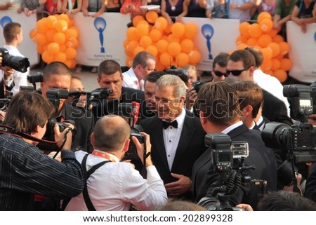 KARLOVY VARY, CZECH REPUBLIC  JULY 4, 2014: Mel Gibson arrived to Karlovy Vary International Film Festival to pick up a Crystal Globe for his contribution to cinema