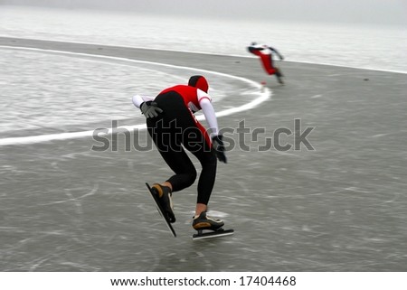 Two racing skaters on the competition