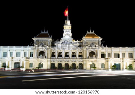 The city hall of Ho chi minh, capital of vietnam with streak of traffic lights