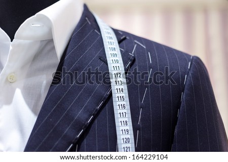 Suits on shop mannequins 商業照片 © 
