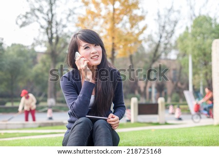 young asian woman with laptop