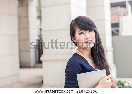 young asian woman with laptop