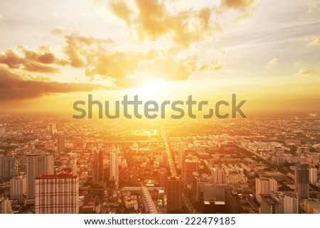 bird view of urban cityscape at sunset