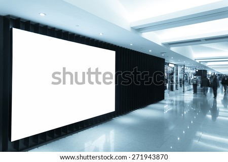billboard in shopping mall corridor
