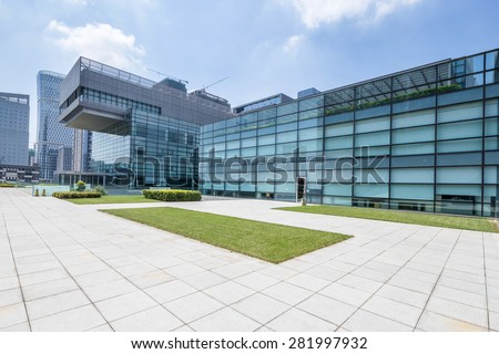 Chengdu,China-July 23,2014:Empty road at modern building exterior in Chengdu.It\'s epitome of fast development in southwest china.
