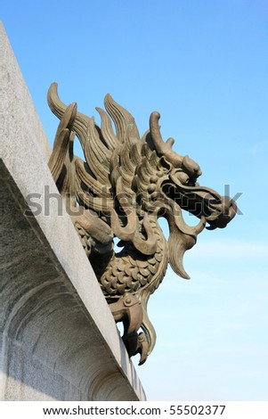 Dragon been Design On The Roof Of A Temple