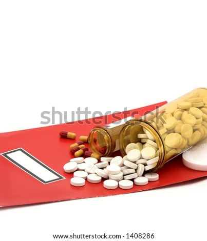 file folder and pills