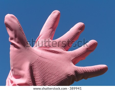 Hand in a pink glove