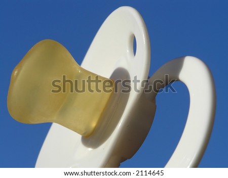 Close-up of white comforter against clear blue sky
