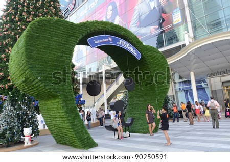 BANGKOK - DEC 3: Christmas festival on December 03,2011 in Central World Plaza,bankok,Thailand. The decorations on the tree with Christmas lights and a large statue of a bear
