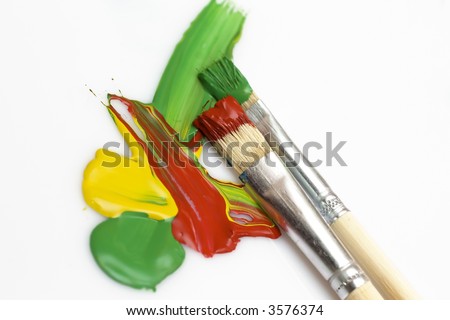 paint brushes and abstract painting
