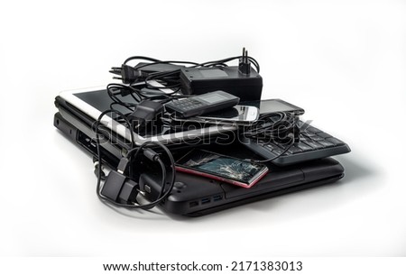 Image, Stock Photo Electronic scrap: Stacks of old mobile phone and smartphone parts