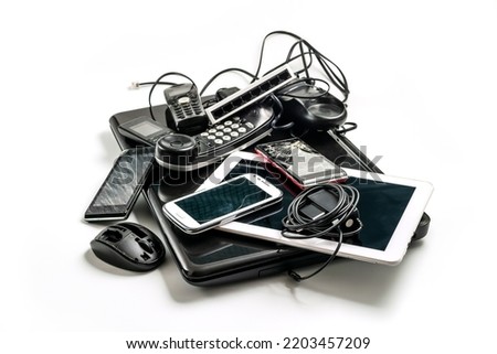 Similar – Image, Stock Photo Electronic scrap: Stacks of old mobile phone and smartphone parts