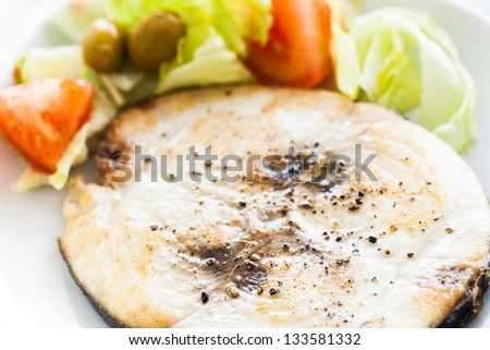 Slice of fresh and cooked spanish tuna fish, called \