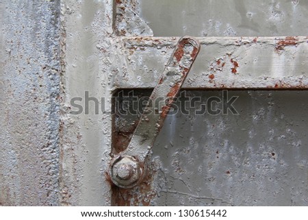 rusty old iron door handle to enter the bunker/mysterious login