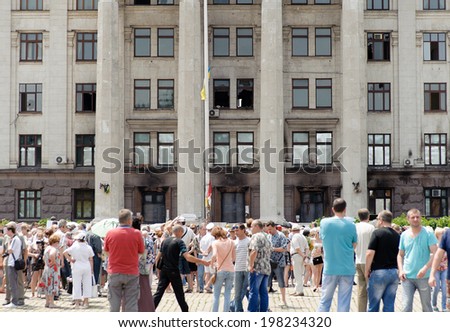 ODESSA, UKRAINE - JUNE 8, 2014: Memorial service near the burnt Trade Unions House in Odessa. Ceremony devoted to the people who died in clashes on 2 May 2014