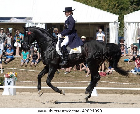 HASTINGS, NEW ZEALAND - MARCH 21: Jody Hartstone rides Whisper to win the CDI 3 star FEI Grand Prix Freestyle Dressage, Horse of the Year March 21, 2010 in Hastings, New Zealand.