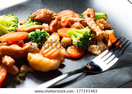 Delicious prepared sliced meet and vegetables with curry