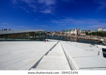 OSLO, NORWAY - AUGUST 11: National Oslo Opera House shines at sunrise on August 11, 2012. Oslo Opera House was opened on April 12, 2008 in Oslo, Norway