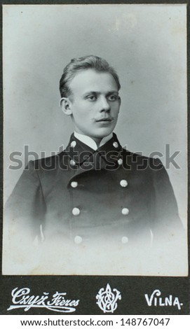 VILNIUS, RUSSIAN EMPIRE - CIRCA 1910: vintage photo of young elegant man. Nostalgic picture. Circa 1910. Russian Empire, beginning of 20th century.