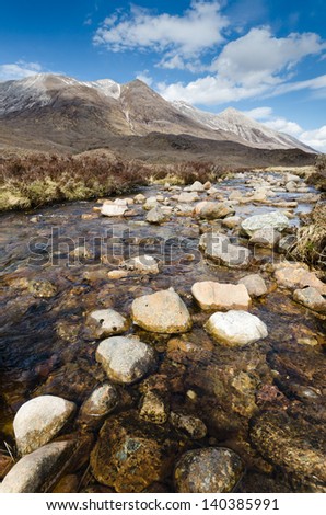 Rocky stream from Beinn Eighe / Rocky mountain stream flows from the Beinn Eighe range