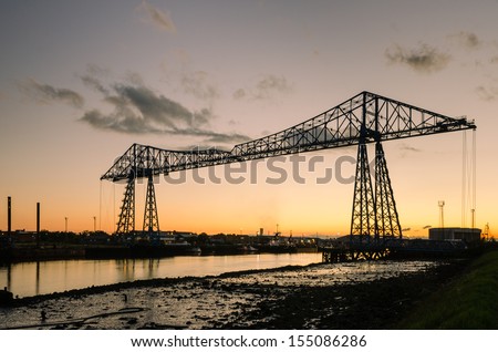 Middlesbrough Transporter Bridge at dusk / The Middlesbrough Transporter Bridge carries people and cars over the Tees in a suspended gondola