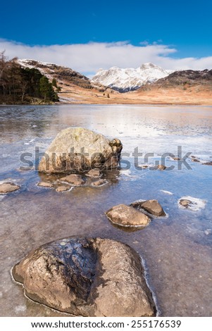 Frozen Blea Tarn portrait / Blea Tarn is a remote  small lake among the Langdale Fells in the Lake District