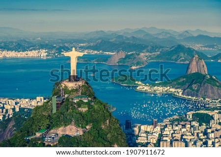 Aerial helicopter panorama of Botafogo Bay with Christ and Sugar Loaf Mountain in Rio de Janeiro, Brazil