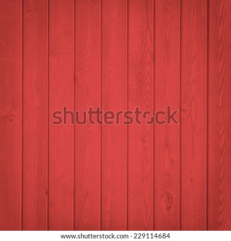 Horizontal red wooden fence close up