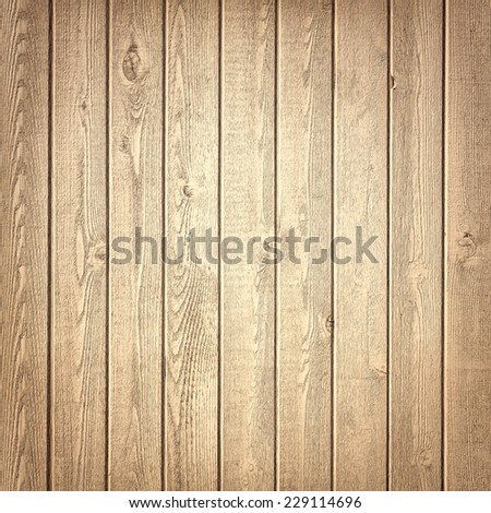 Vertical brown wooden fence close up