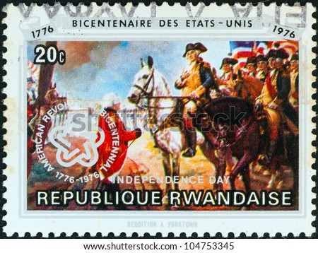 RWANDA - CIRCA 1976: A stamp printed in Rwanda issued for the bicentenary of American Revolution shows the surrender at Yorktown, circa 1976.