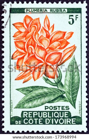 IVORY COAST - CIRCA 1961: A stamp printed in Ivory Coast shows Plumeria rubra plant, circa 1961.