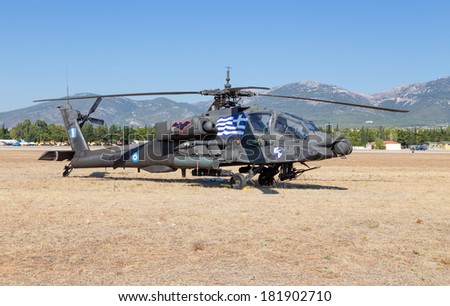 ATHENS, GREECE - SEPTEMBER 28: A Greek Army AH-64A+ Apache attack helicopter parked in the airport on September 28, 2013 in Tatoi, Athens, Greece. HAF uses 20 helicopters of this type and 12 AH-64D.