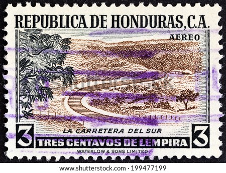 HONDURAS - CIRCA 1956: A stamp printed in Honduras shows Trunk road to the south, circa 1956.