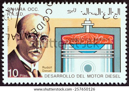 WESTERN SAHARA - CIRCA 1993: A stamp printed in Western Sahara shows Rudolf Diesel and open combustion chamber, circa 1993.