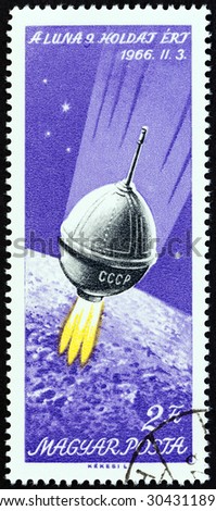 HUNGARY - CIRCA 1966: A stamp printed in Hungary issued for the Moon Landing of Luna 9 mission shows Luna 9 in space, circa 1966.