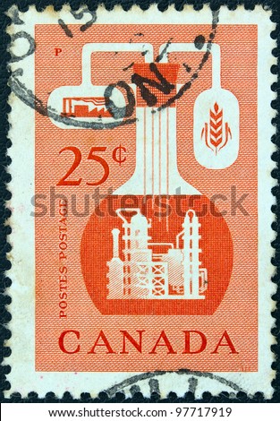 CANADA - CIRCA 1956: A stamp printed in Canada issued to emphasize the importance of the chemical industry in the economy of Canada, circa 1956.