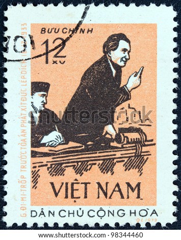 VIETNAM - CIRCA 1972: A stamp printed in North Vietnam issued for the 90th birth anniversary of Bulgarian statesman Georgi Dimitrov shows Dimitrov at Leipzig court, 1933, circa 1972.