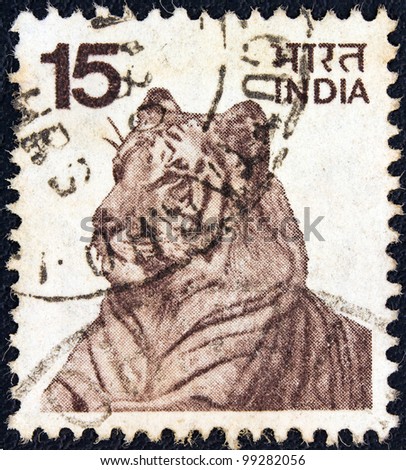 INDIA - CIRCA 1974: A stamp printed in India shows a Bengal tiger, circa 1974.