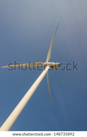White big windmill - Netherlands. Blue sky background.