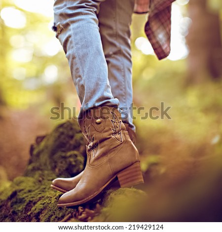Cowboy fashion style. Boots close-up outdoors