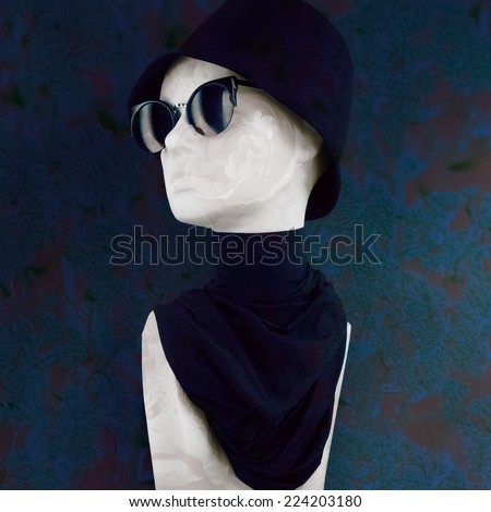Sophisticated Looking Fashion Mannequin Wearing Black Hat, Sunglasses and Scarf