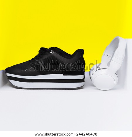 Fashion Urban style. Stylish shoes and headphones in bright design.