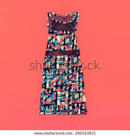 Fashionable ladies Dress on bright background. Stylish print