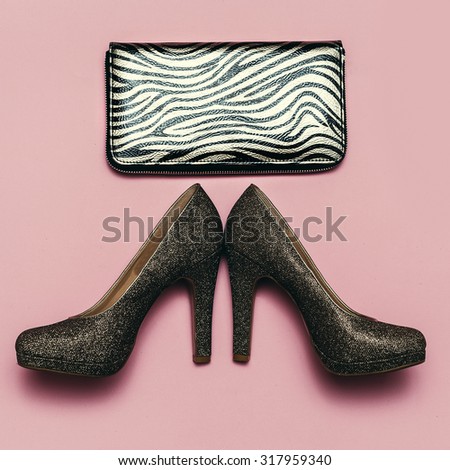 Stylish shoes and clutch. Gold accent