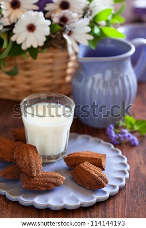 Chocolate madeleine cookies with lavender and lemon, selective focus