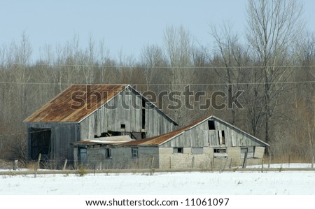 old barn on a empty field