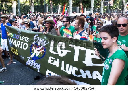 MADRID, SPAIN - JULY, 6: People participating on a demonstration at the Gay Pride parade on July 6, 2013 in Madrid (Spain). Near 1,200,000 people participated at the Gay Pride Parade in Madrid.