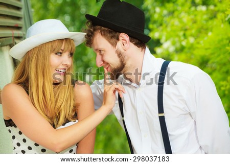 Summer holidays love relationship and dating concept - romantic happy couple retro style outdoor